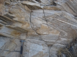 Intrafolial folds with hinges parallel to the stretching lineation in the mylonitic orthogneiss of Lubrín (Marchal shear zone, Betics).