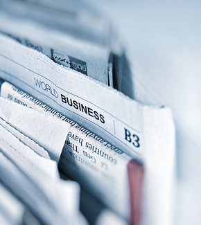 Newspapers bunched together