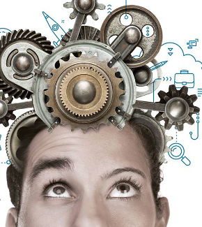 A young man wearing a crown made out of spur gears on his head