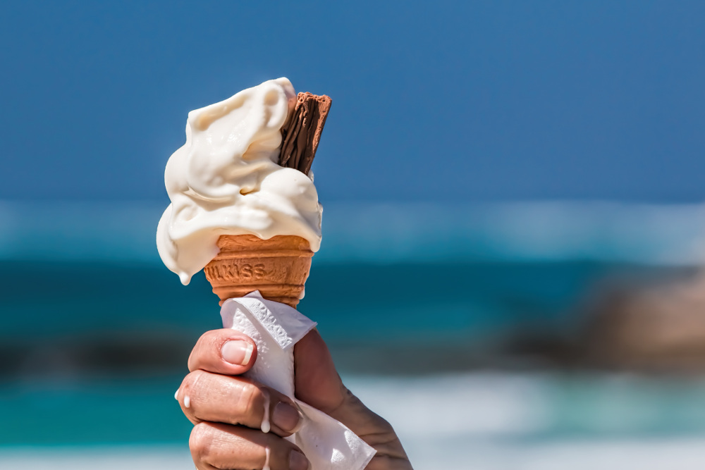 A hand holding an ice cream
