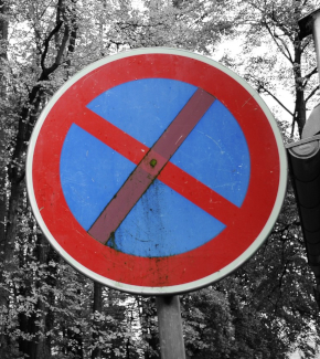 A "prohibited" sign in a forest