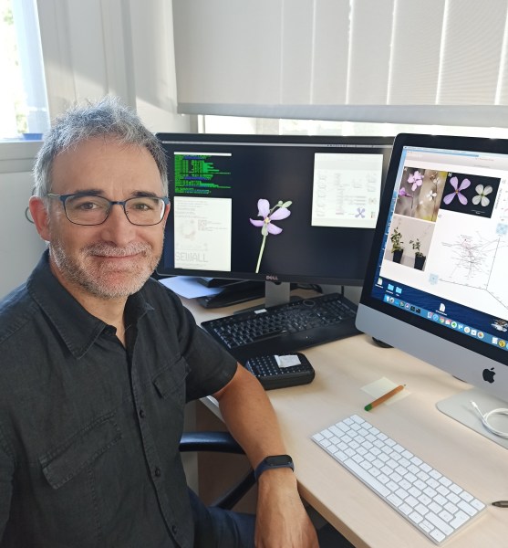 A researcher at a desk