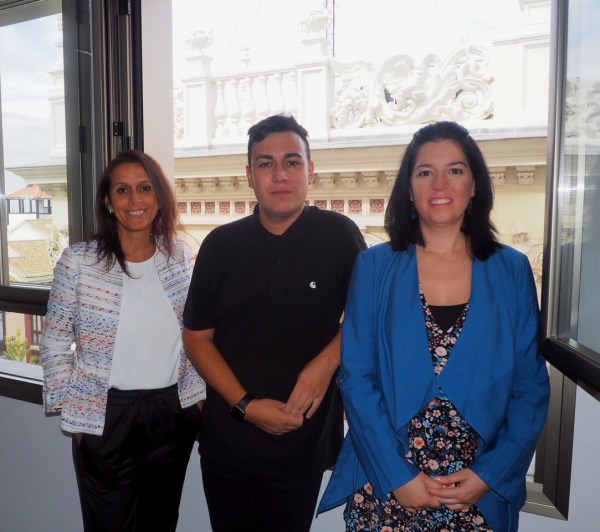 Three researchers posing for a photo