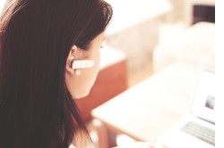 A woman with an earpiece