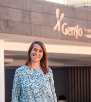 A researcher standing in front of the Genyo building