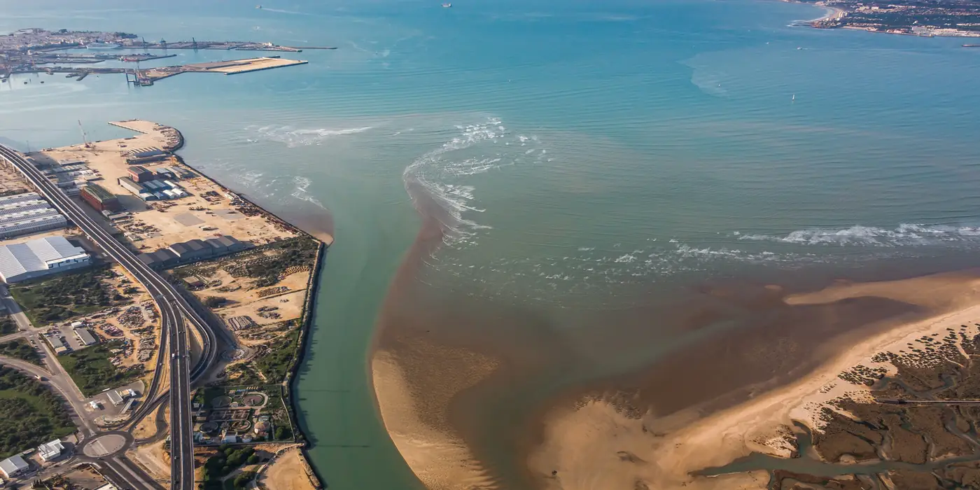Aerial view of a river mouth and its sediment plume